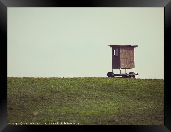 Brown hunter seat on the field Framed Print by Ingo Menhard