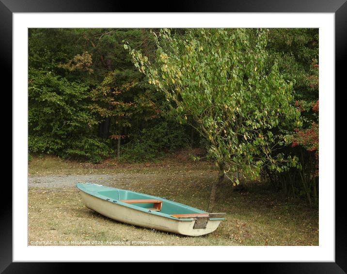 Boat near the trees Framed Mounted Print by Ingo Menhard