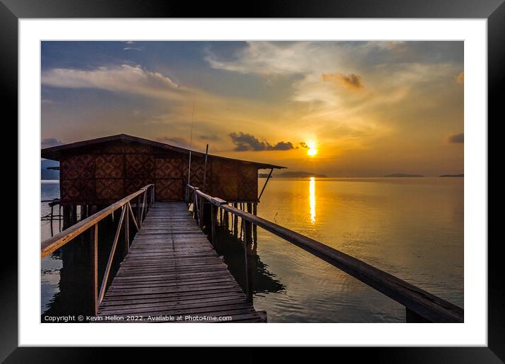 Boardwalk to house on the water at sunrise,  Framed Mounted Print by Kevin Hellon