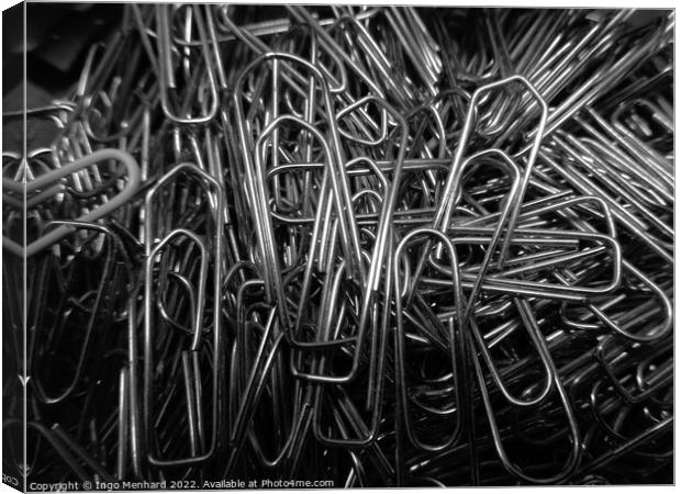 Closeup shot of nickel-plated paper clips Canvas Print by Ingo Menhard