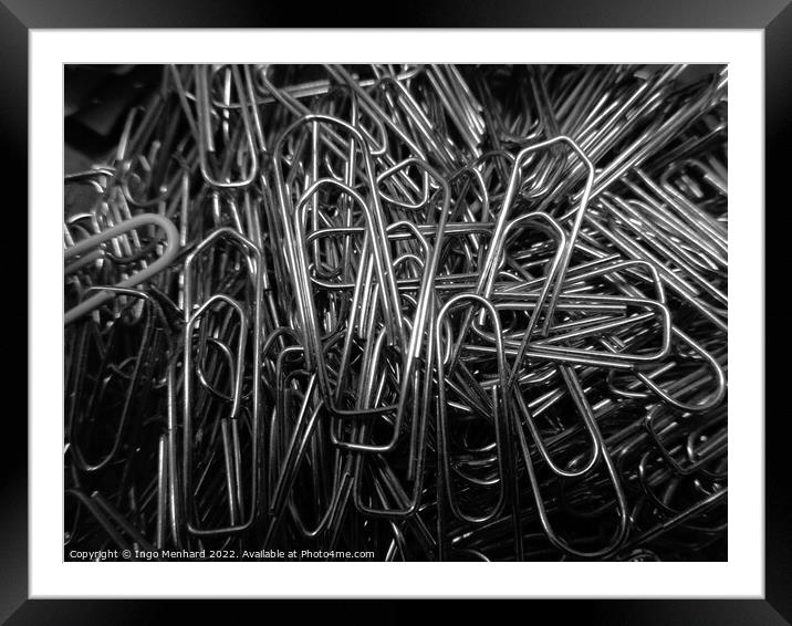 Closeup shot of nickel-plated paper clips Framed Mounted Print by Ingo Menhard