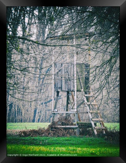 Wooden hunter seat hidden behind tree branches Framed Print by Ingo Menhard