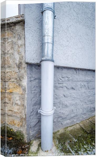 Closeup shot of a gutter on the edge of a house Canvas Print by Ingo Menhard
