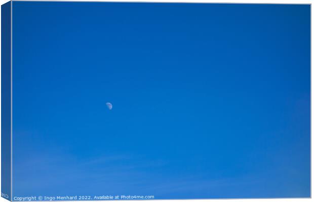 Beautiful shot of a peaceful blue sky and a moon Canvas Print by Ingo Menhard