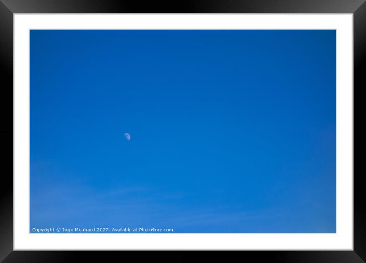 Beautiful shot of a peaceful blue sky and a moon Framed Mounted Print by Ingo Menhard