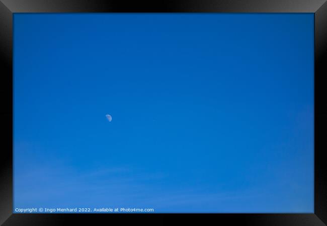 Beautiful shot of a peaceful blue sky and a moon Framed Print by Ingo Menhard