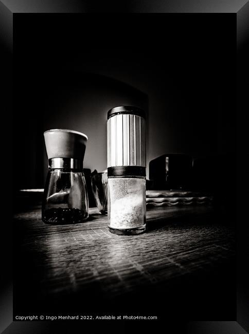 Closeup grayscale of a salt shaker on the wooden surface Framed Print by Ingo Menhard