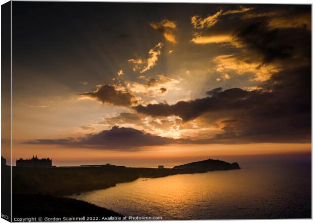 A dramatic sunset over Towan Head in Newquay Canvas Print by Gordon Scammell