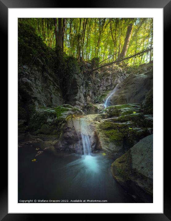 Stream waterfall inside a forest. Chianni, Tuscany Framed Mounted Print by Stefano Orazzini