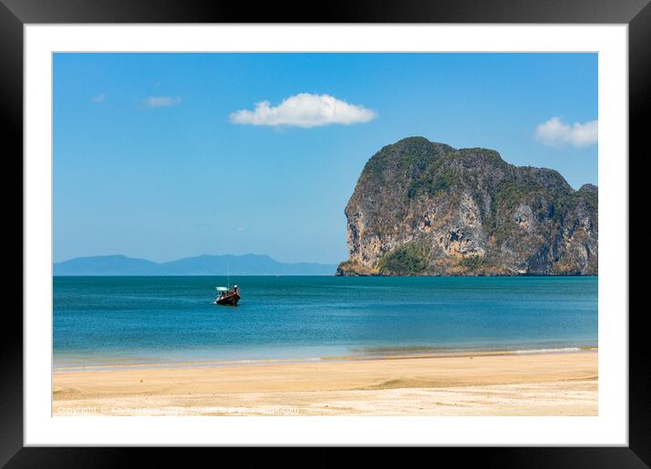 Long tail boat off Pak Meng Beach Framed Mounted Print by Kevin Hellon