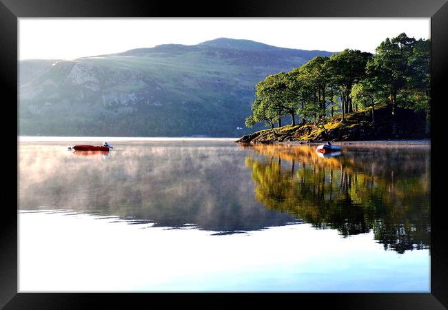 Reflections on Derwent Water, Keswick, Cumbria. Framed Print by john hill