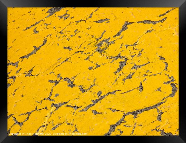 A closeup shot of yellow cracked surface Framed Print by Ingo Menhard