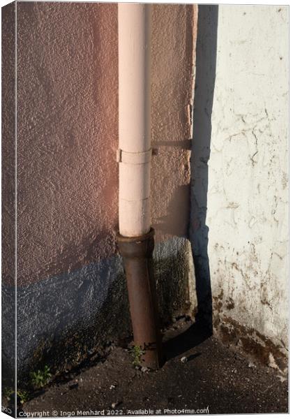 Vertical shot of an old downpipe Canvas Print by Ingo Menhard