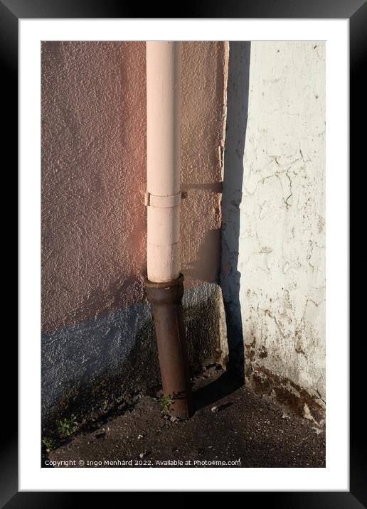 Vertical shot of an old downpipe Framed Mounted Print by Ingo Menhard
