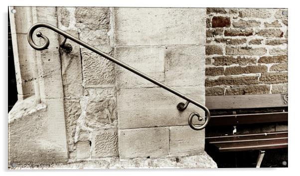 Closeup shot of a decorative metal rail on an old stone wall - perfect for background Acrylic by Ingo Menhard