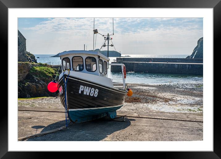 Fishing boat in old harbour at Mullion Cove in Cornwall Framed Mounted Print by Steve Heap