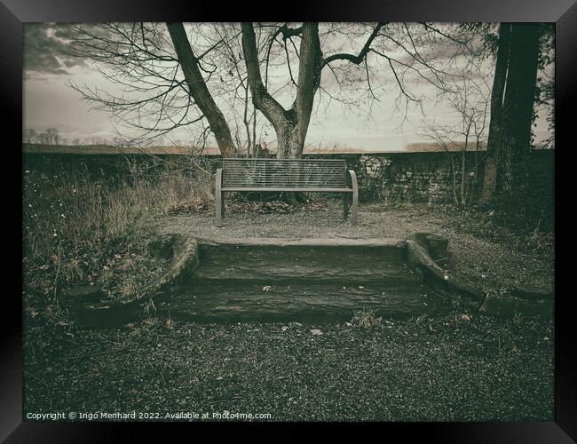 Mysterious autumn scene with a single empty bench Framed Print by Ingo Menhard