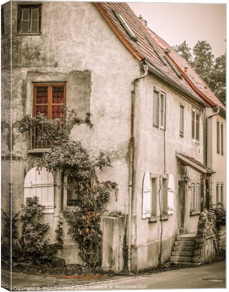 A facade of an old building Canvas Print by Ingo Menhard