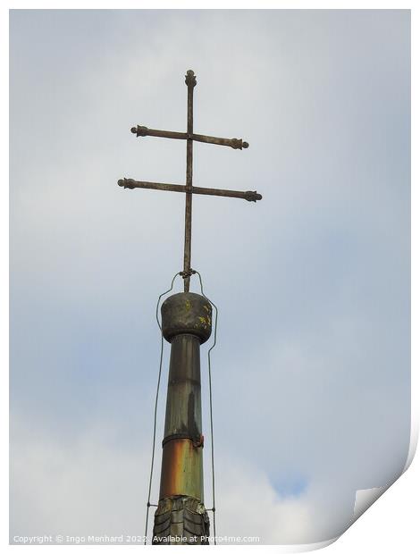 A vertical shot of a metallic cross on a cloudy sky background Print by Ingo Menhard