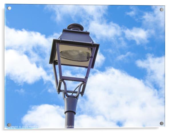 A low angle shot of an old metal street lamp against blue cloudy sky Acrylic by Ingo Menhard