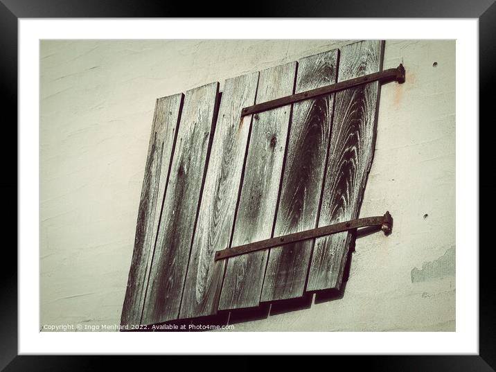 An aged wall with wooden planks Framed Mounted Print by Ingo Menhard