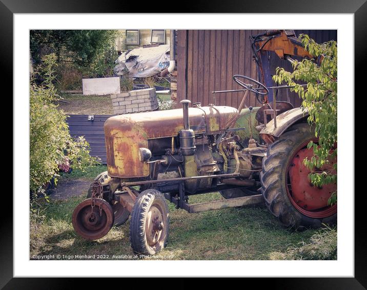Old German tractor in the garden Framed Mounted Print by Ingo Menhard