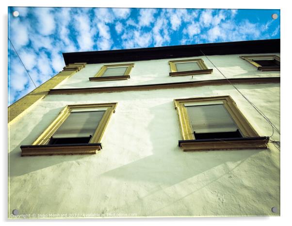 A low angle view of a building under a blue cloudy sky Acrylic by Ingo Menhard