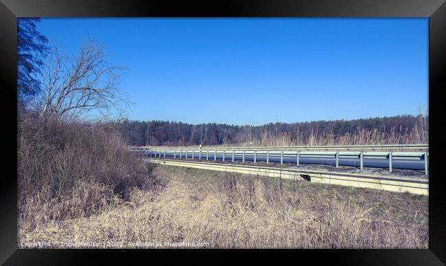 Beautiful view of an empty highway road with road barriers Framed Print by Ingo Menhard