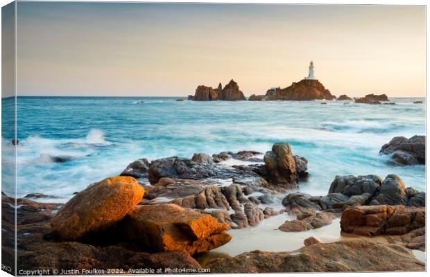 La Corbiére lighthouse, Jersey, Channel Islands Canvas Print by Justin Foulkes