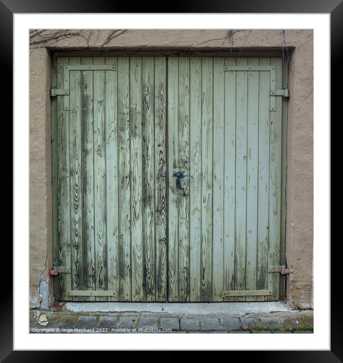 The old wooden green door with a rusty lock and handle Framed Mounted Print by Ingo Menhard