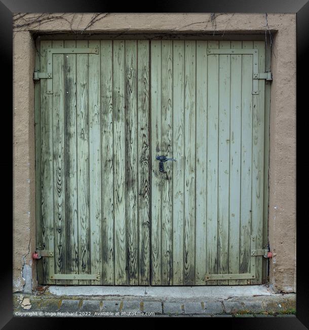 The old wooden green door with a rusty lock and handle Framed Print by Ingo Menhard