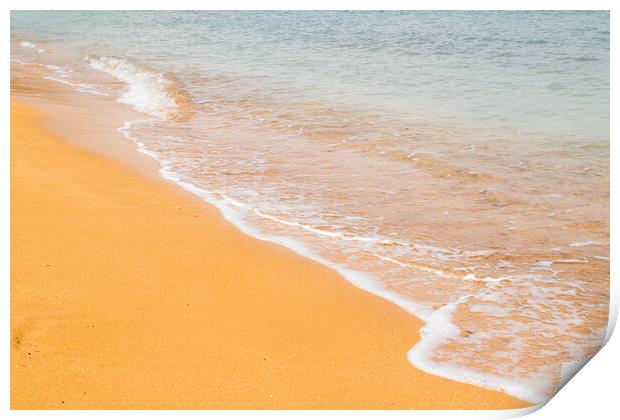 Waves lap up on Ramla Beach Print by Jason Wells
