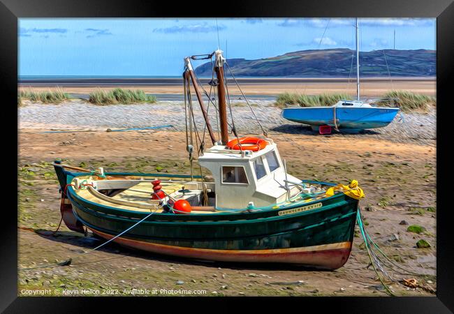 Boats moored in Red Wharf Bay, Anglesey at low tid Framed Print by Kevin Hellon