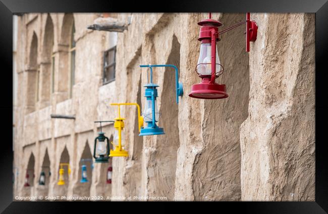 Colored lanterns hanging in old town Souq Waqif, Doha, Qatar Framed Print by SnapT Photography