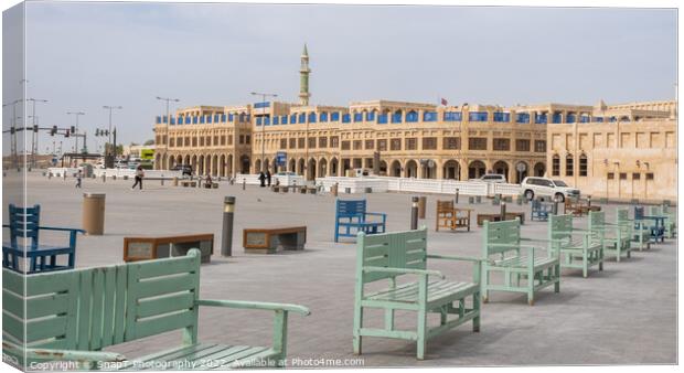 Green and blue coloured benches in rows in Souq Waqif Square, Doha, Qatar Canvas Print by SnapT Photography