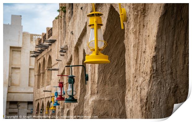 Colored lanterns hanging in old town Souq Waqif, Doha, Qatar Print by SnapT Photography