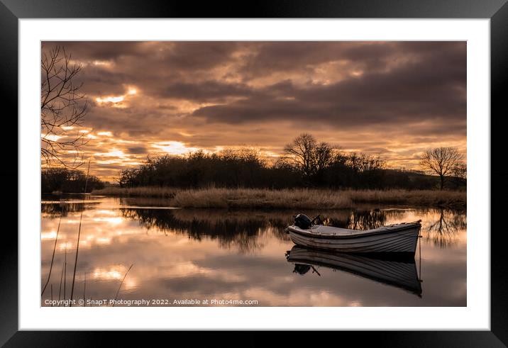 Sunset reflecting over the River Dee in Winter, with a boat in the river Framed Mounted Print by SnapT Photography