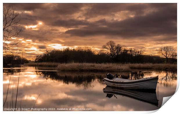 Sunset reflecting over the River Dee in Winter, with a boat in the river Print by SnapT Photography
