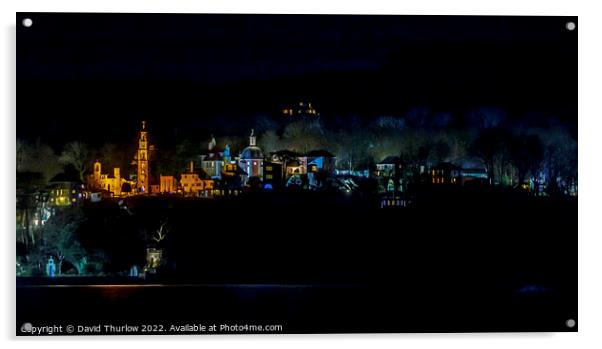 The lights of the Italianate village of Portmeirion illuminate the surrounding trees Acrylic by David Thurlow