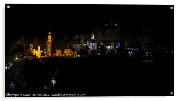 The lights of the Italianate village of Portmeirion illuminate the surrounding trees Acrylic by David Thurlow