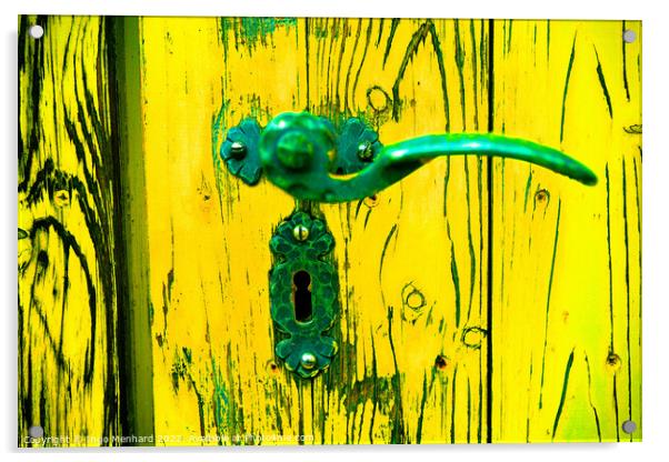 A closeup shot of an old metal handle and lock on the weathered yellow wooden door Acrylic by Ingo Menhard