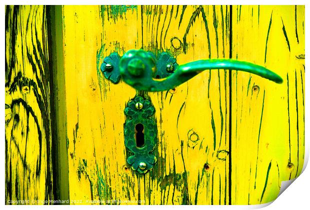A closeup shot of an old metal handle and lock on the weathered yellow wooden door Print by Ingo Menhard