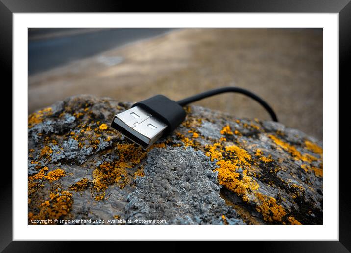 Closeup shot of a USB cord on a moldy rock Framed Mounted Print by Ingo Menhard