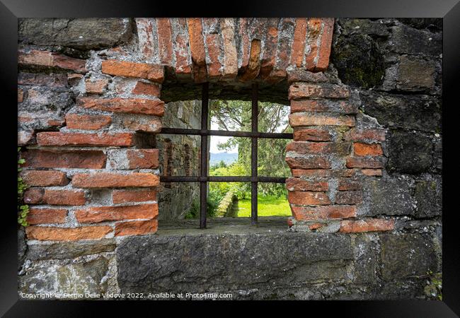 loopholes in the old castle walls Framed Print by Sergio Delle Vedove