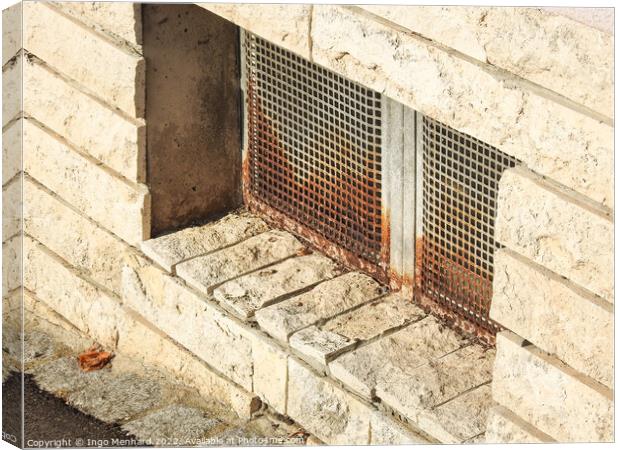 An aged wall with dirty ventilation Canvas Print by Ingo Menhard