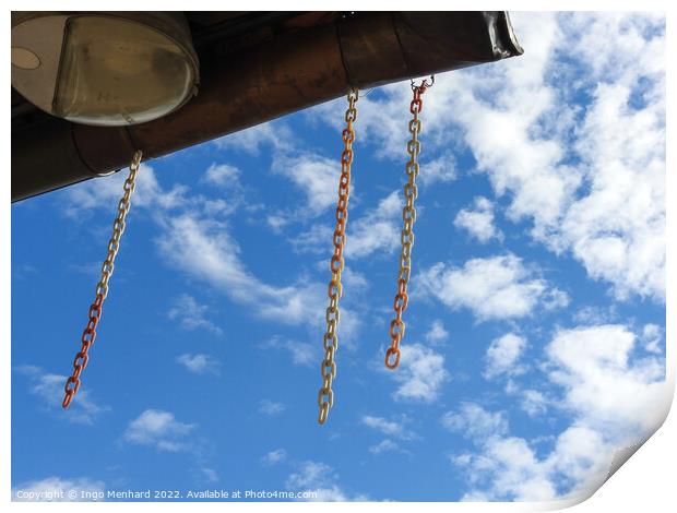 A low angle shot of hanging chains against cloudy sky Print by Ingo Menhard
