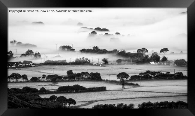Mist on the fields Framed Print by David Thurlow