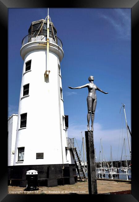Bathing Belle and Harbour lighthouse, Scarborough, Yorkshire. Framed Print by john hill
