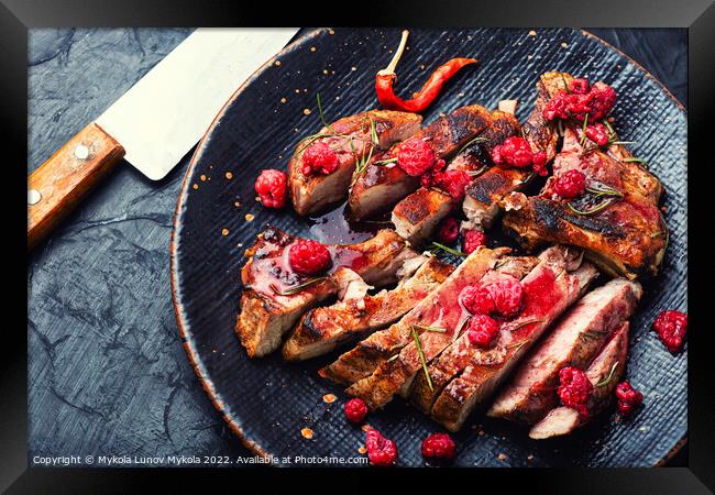 Fried steak with raspberry sauce Framed Print by Mykola Lunov Mykola