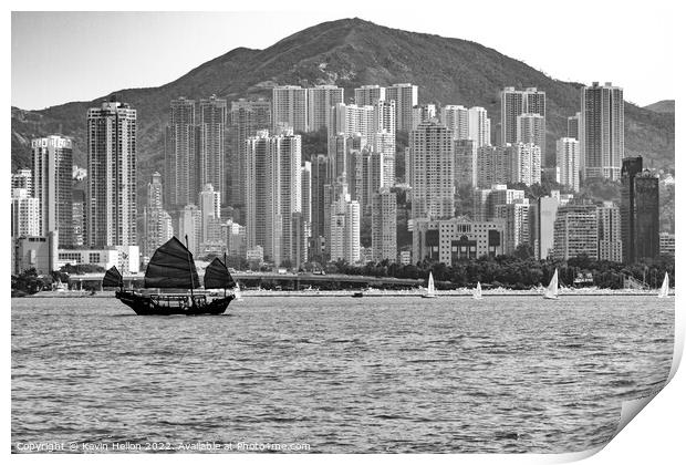 Junk sailing in Victoria Harbour, Hong Kong Print by Kevin Hellon